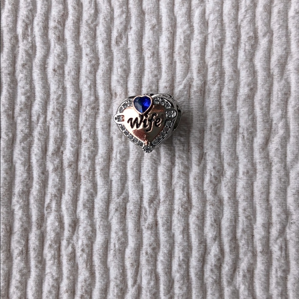 Wife Rose gold charm w/ blue heart stone.